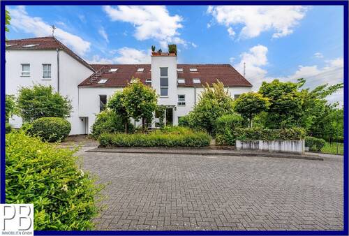 Außenansicht - Vermietungssichere Maisonette-Wohnung in beliebter Lage am Naturschutzgebiet