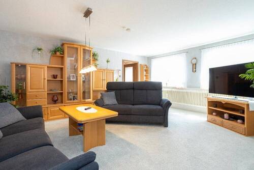 Das Wohnzimmer im OG - Einfamilienhaus mit 249,90 m² in Stuhr zum Kaufen