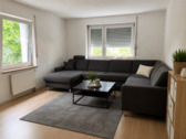 Wohnzimmer - 8 Zimmer Mehrfamilienhaus, Wohnhaus zum Kaufen in Illertissen