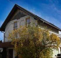 Zweifamilienhaus mit ELW und Gewerbeeinheit in Langenenslingen