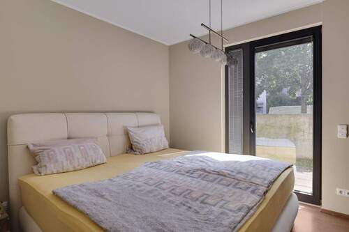 Schlafzimmer - Etagenwohnung mit 82,00 m² in München / Riem zum Kaufen