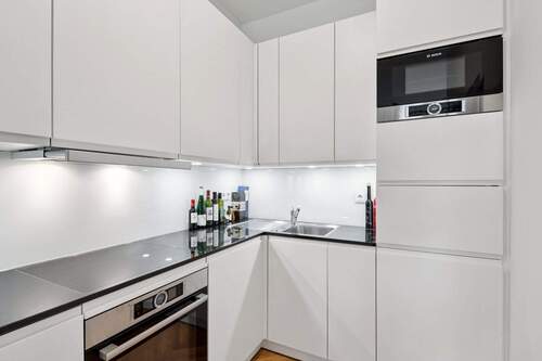 Küche mit Markengeräten - Etagenwohnung mit 96,00 m² in Berlin zum Kaufen