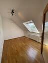 Zimmer im Dachgeschoss - 