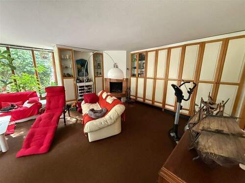 Wohnzimmer A - 4 Zimmer Etagenwohnung in München