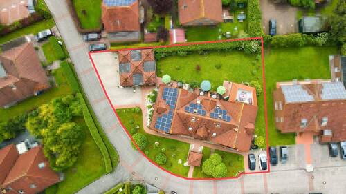 Luftbild auf die Liegenschaft mit 1 Parkplatz - 4 Zimmer Etagenwohnung in Wangerland