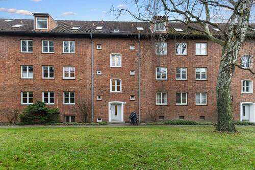 Historisches Mehrfamilienhaus mit ruhigem Innenhof - 3 Zimmer Etagenwohnung zum Kaufen in Hamburg