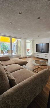 Wohnzimmer - Moderne 2-Zimmer-Wohnung mit Terrasse in Singen (Hohentwiel)