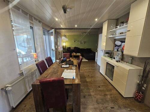 Wohn- und Esszimmer mit Zugang zur Terrasse - 3 Zimmer Reihenmittelhaus in Gronau (Westfalen)