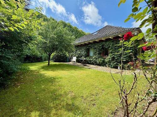 Hausansicht seitlich - 3 Zimmer Einfamilienhaus zum Kaufen in Wacken