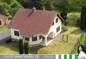 Bild 1 - Mehr Freiraum: Einzugsbereites Einfamilienhaus mit parkähnlichem Freizeitgrundstück in Swisttal