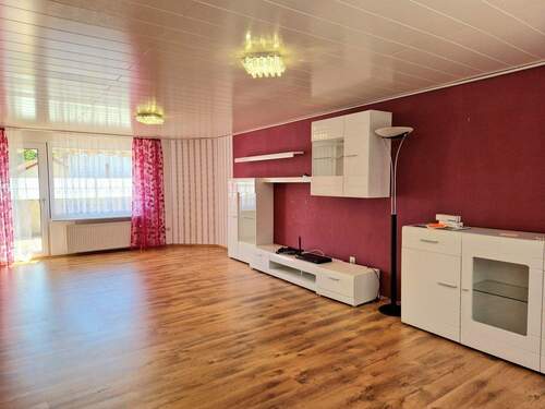 1. OG Wohnzimmer mit Balkon - 