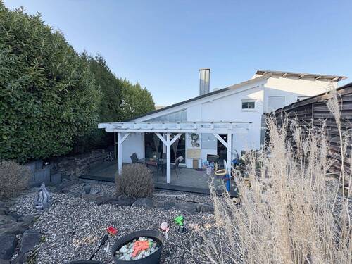 Rückansicht - Warm & einladend: Familienfreundliche Doppelhaushälfte mit Wohlfühlgarten in Ahlen