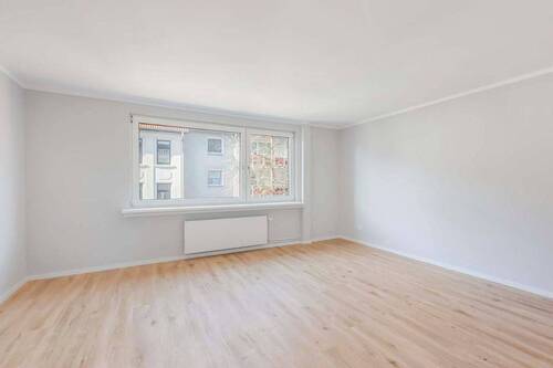 Wohnzimmer Ansicht 2 - Einfamilienhaus in Mülheim an der Ruhr zum Kaufen