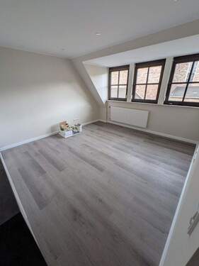 Wohnzimmer - Erstbezug! Stilvolle Wohnung in Toplage von Rüdesheim mit Küche