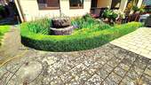 Garten mit Brunnen - 