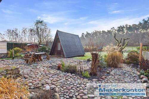 Garten mit Finnhütte und Bungalow - 