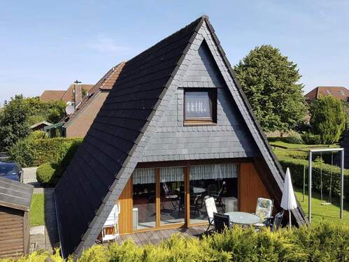 Gartenansicht - 5 Zimmer Mehrfamilienhaus, Wohnhaus zum Kaufen in Wittmund-Carolinensiel