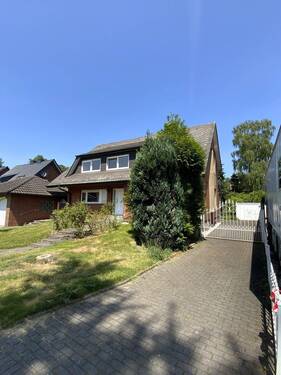 seitlich mit Garagenzufahrt - 6 Zimmer Mehrfamilienhaus, Wohnhaus zum Kaufen in Lünen