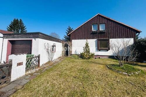 Ansicht mit Garage - Einfamilienhaus mit 115,00 m&sup2; in Hof zum Kaufen