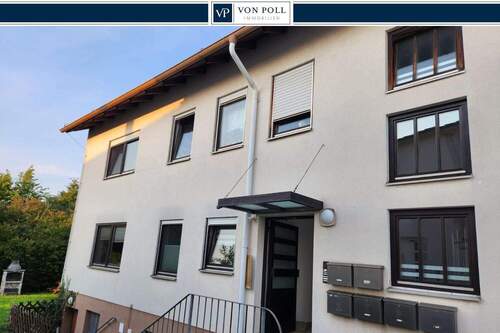 Titelbild - Gepflegtes 6-Parteienhaus in Euerbach mit 6 Garagen und Gartenfläche