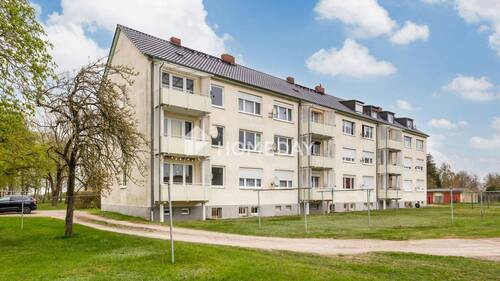 Außenansicht 1 - Helle 3-Zimmer-Wohnung mit Südbalkon, Gemeinschaftsgarten und Garage in ruhiger Lage