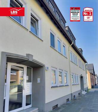 Hausansicht - Modernisierte 2,5 Zi. Erdgeschosswohnung in Fuhlenbrock mit Garage