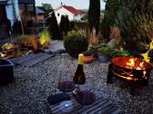 1 Garten oberer Sitzplatzbereich mit Feuerschale - 