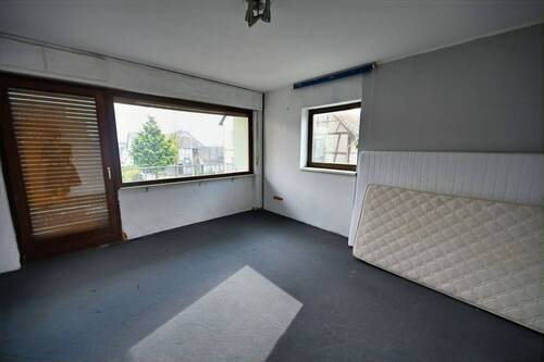 Erdgeschoss Whg. 1 Wohnzimmer - Mehrfamilienhaus, Wohnhaus mit 269,10 m&sup2; in Dahlheim zum Kaufen