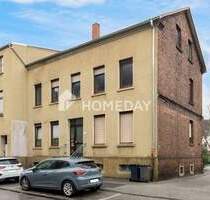 Sanierungsbedürftige MFHs mit Anbau und Baugrundstück und 15 Garagen - Gelsenkirchen-Erle