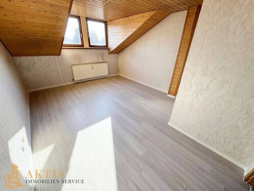 Wohnzimmer Ansicht 1 - 3 Zimmer Etagenwohnung zur Miete in Niederdorfelden