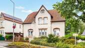 Außenansicht 2 - Zweifamilienhaus mit Gestaltungspotenzial, idyllischem Garten und Stellplätzen in begehrter Lage