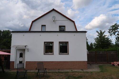 Hausansicht Giebelseite.JPG - Mehrfamilienhaus, Wohnhaus mit 146,00 m² in Berlin zum Kaufen
