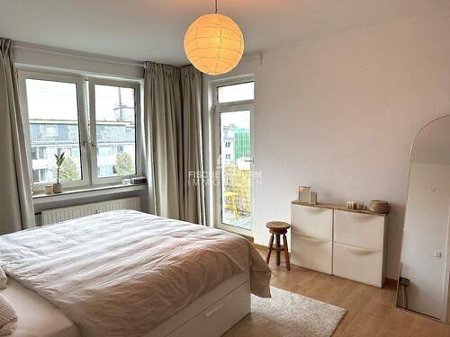 ein Schlafzimmer mit Balkon - 