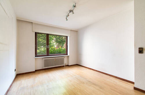 Helles Schlafzimmer mit freundlicher Atmosphäre - 