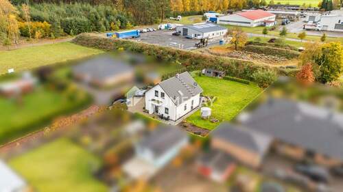 Außenansicht Drohne 5-1 - Einfamilienhaus mit 134,00 m² in Nossentiner Hütte zum Kaufen