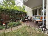 Terrasse und Garten - Grüne Stadtoase in Bestlage von Obersendling: 2-Zimmer-Gartenwohnung mit Terrasse und Nähe zur Isar