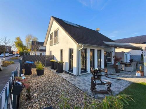 Gartenansicht - Einfamilienhaus zu verkaufen - 699.000,00 EUR Kaufpreis, ca.  150,00 m² Wohnfläche