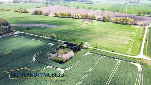 Luftaufnahme - 5 Zimmer Einfamilienhaus zum Kaufen in Millienhagen-Oebelitz