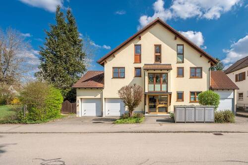 Hausansicht - AIGNER - Traumhafte 3-Zimmer-Wohnung mit eigenem Gartenanteil