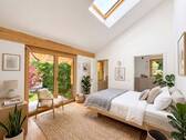 Schlafzimmer mit angrenzendem Bad und separater Toilette
- 