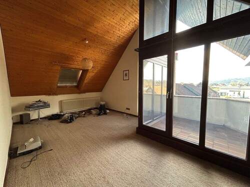 Wohnzimmer im Dachgeschoss mit Ausgang... - 