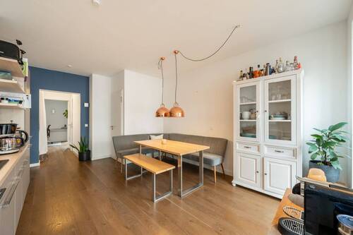 Offene_Kueche_mit_Essbereich - 3 Zimmer Etagenwohnung zum Kaufen in München