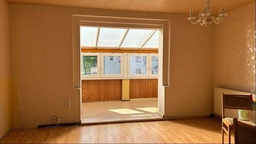 Wohnzimmer mit Wintergarten - 