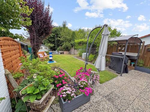 Garten - Wohlfühlhaus mit Gartenidylle - vermietetes Reihenmittelhaus in bester Lage