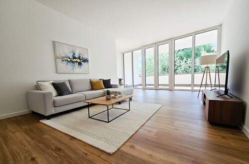 Wohnzimmer - digital gestaged - 3 Zimmer Etagenwohnung zum Kaufen in Frankfurt am Main