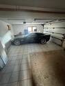 53 große Doppel-Triple-Garage unter Terrasse - 