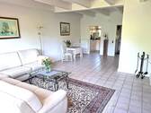 Wohnzimmer zur Küche - 4 Zimmer Reihenmittelhaus in Timmendorfer Strand