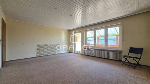 Wohnzimmer mit Zugang Wintergarten - 
