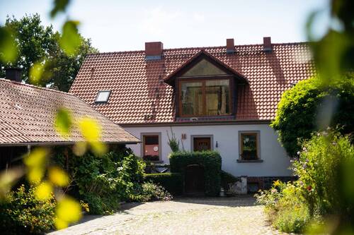 Rückseite und Innenhof - Einfamilienhaus mit 250,00 m² in Fehrbellin-Langen zum Kaufen