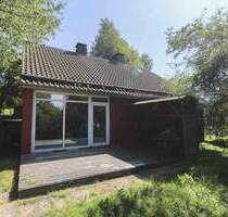 Familienfreundliches Einfamilienhaus mit großem Grundstück und ausgebautem Dachgeschoss in Neuhaus - Holzminden